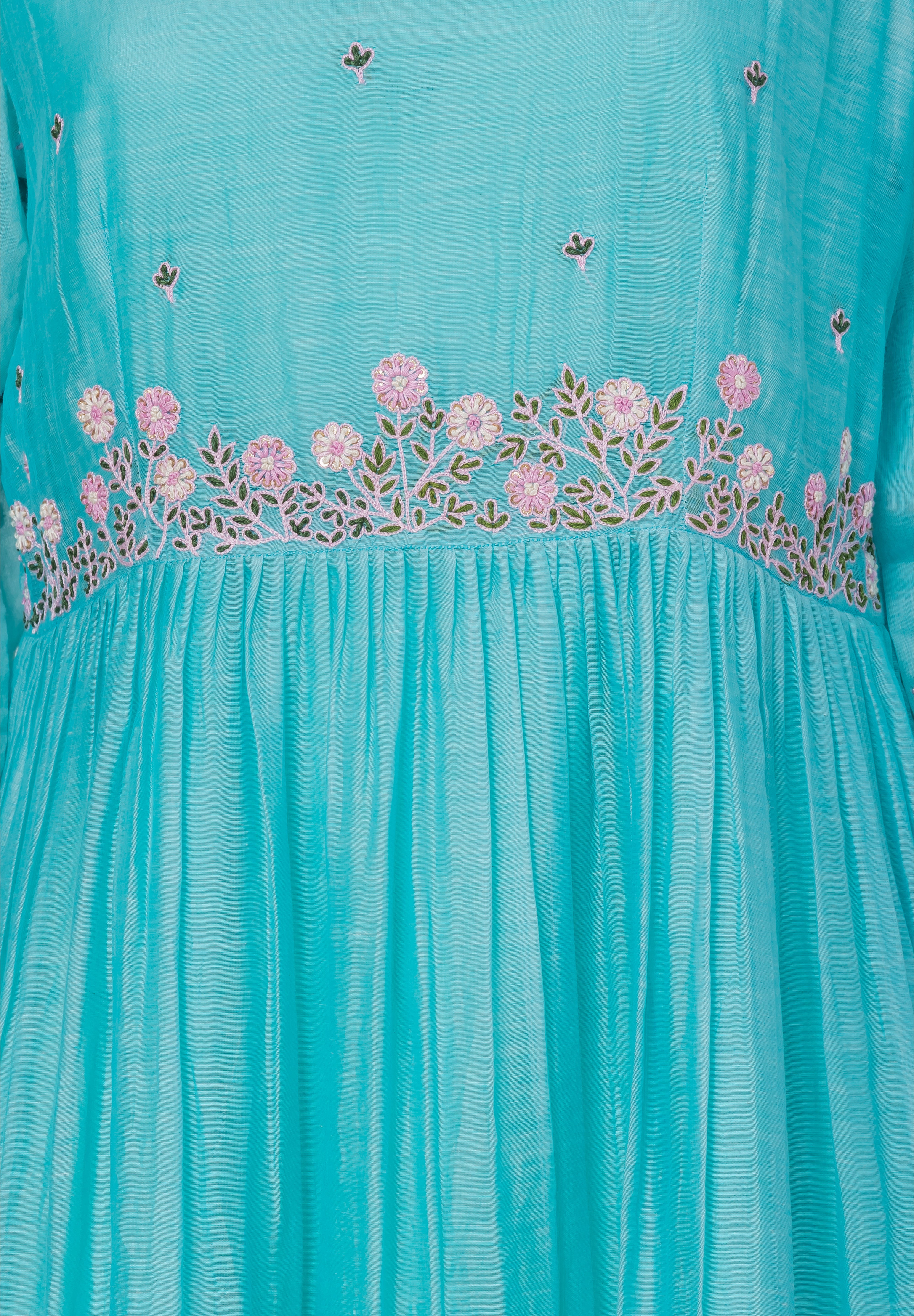 Turquoise A-line ethnic midi dress with floral embroidery and gathered waist, close-up view