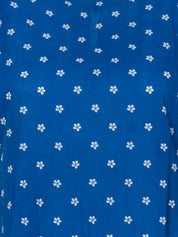 Blue cotton midi dress with white polka dot pattern, A-line silhouette, sleeveless design, close-up texture view