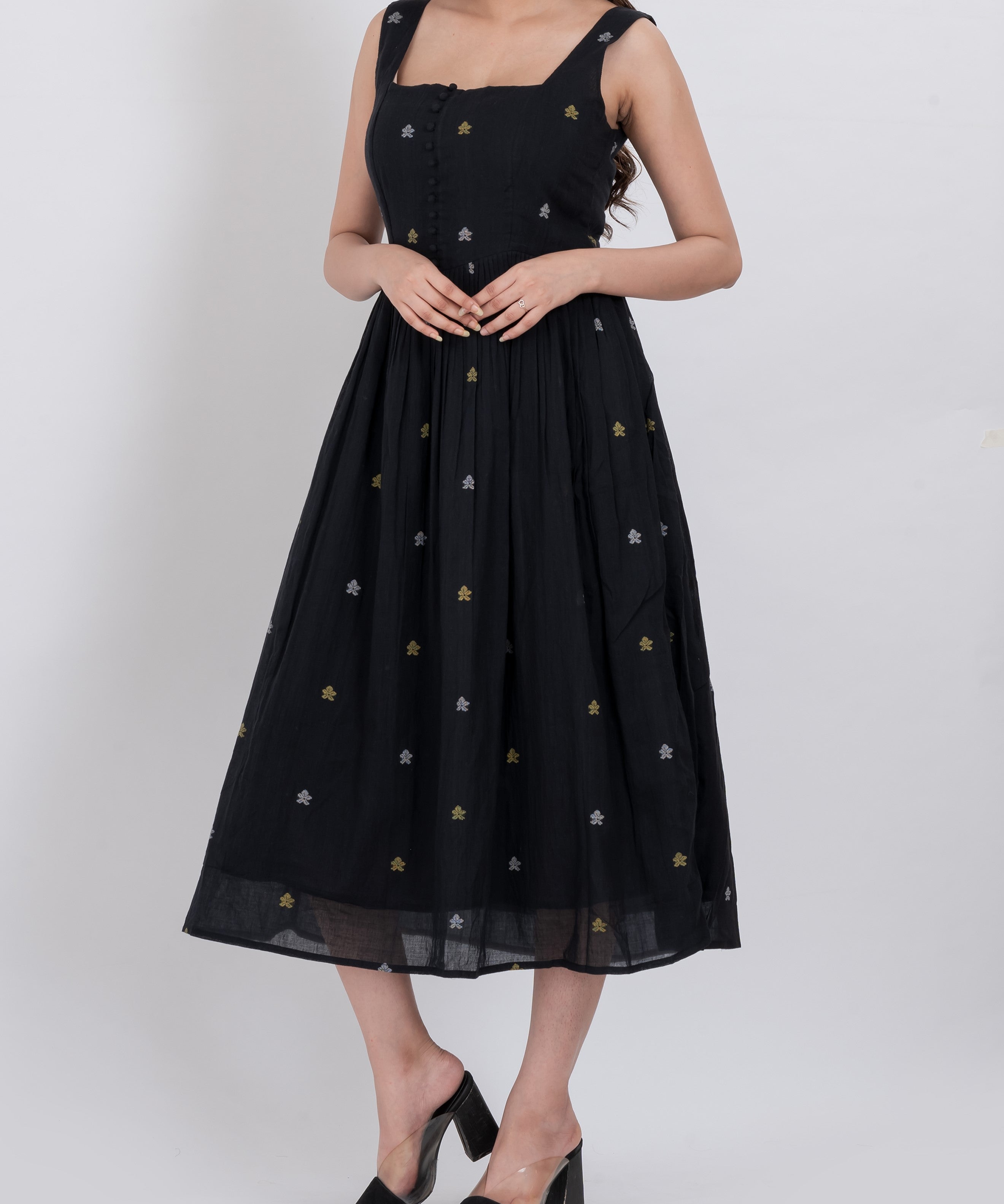  Floral embroidered handwoven cotton dress with square neckline and button front design.