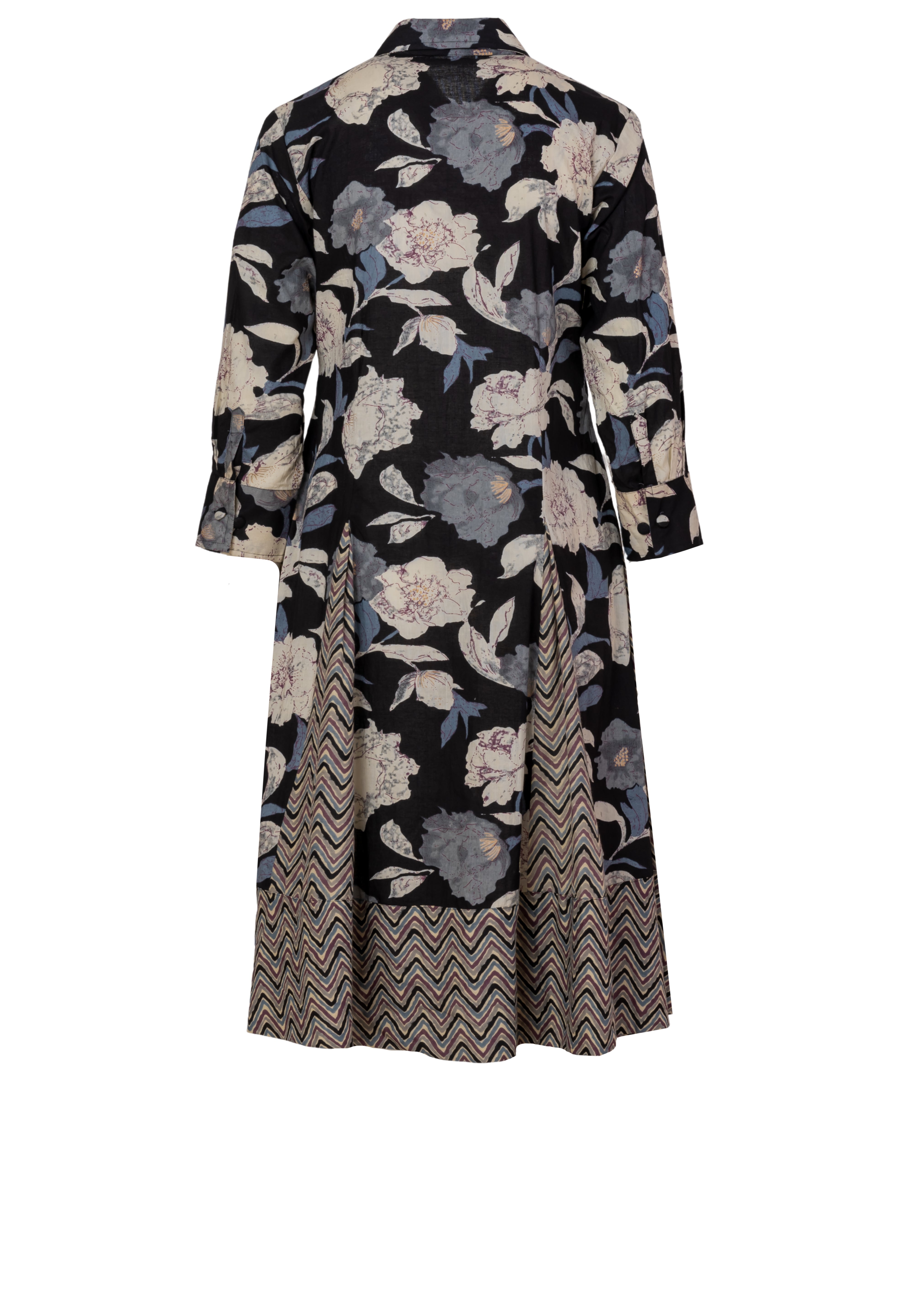 Black cotton shirt dress with floral and chevron print, back view, long sleeves, flared skirt, button cuffs