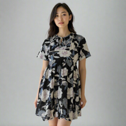 Black floral print babydoll dress with adjustable tie neck detail