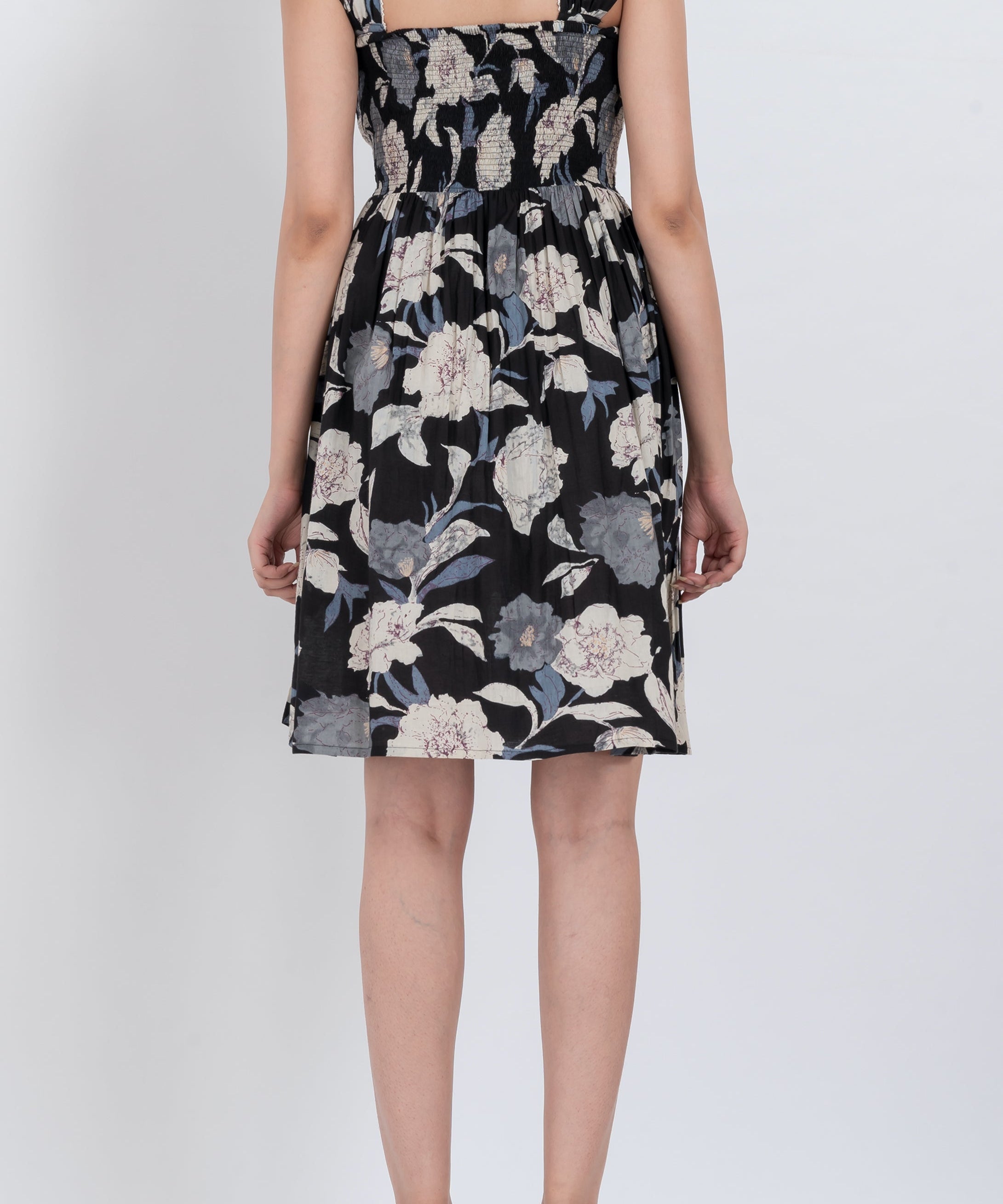 Black floral puff sleeve dress with square neckline and feminine design
