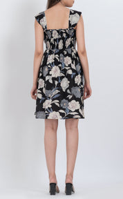 Black floral puff sleeve dress with square neckline and feminine design