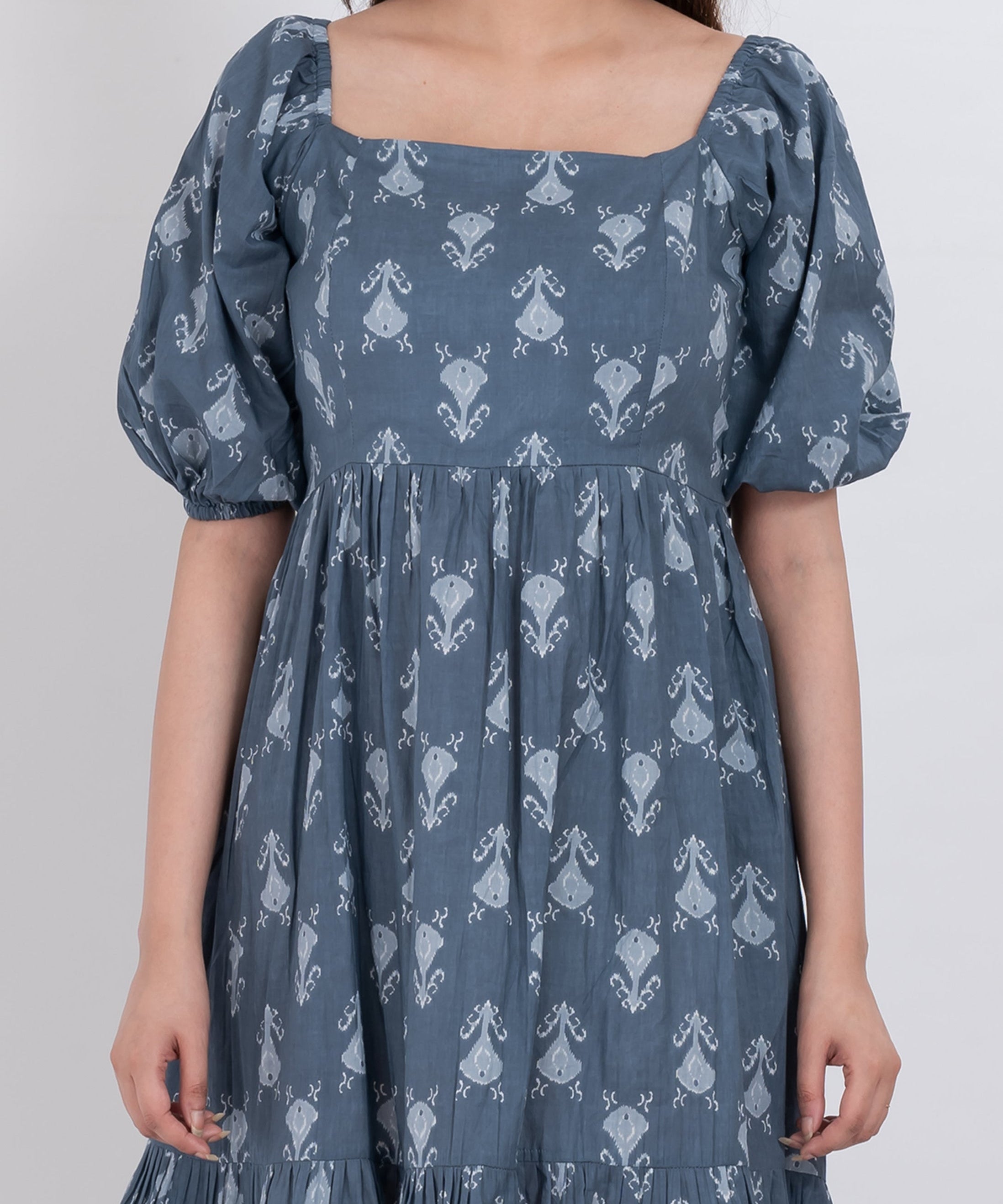 Square neck floral puff sleeve dress with flowy skirt and ruffled hem