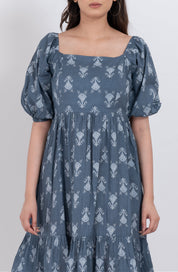 Square neck floral puff sleeve dress with flowy skirt and ruffled hem