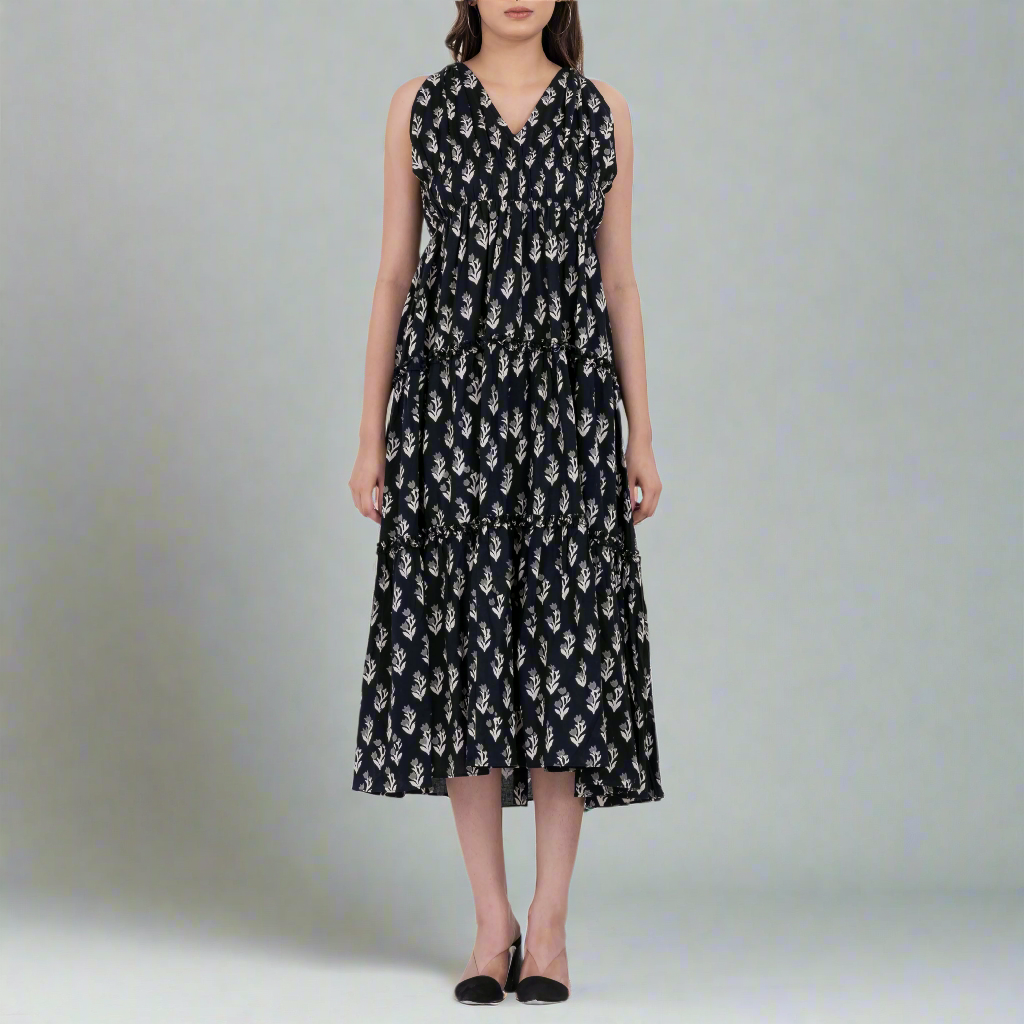 Boho V-neck black floral tiered dress with ivory floral accents and ruffled hem