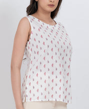 Sleeveless floral print blouse with delicate block patterns