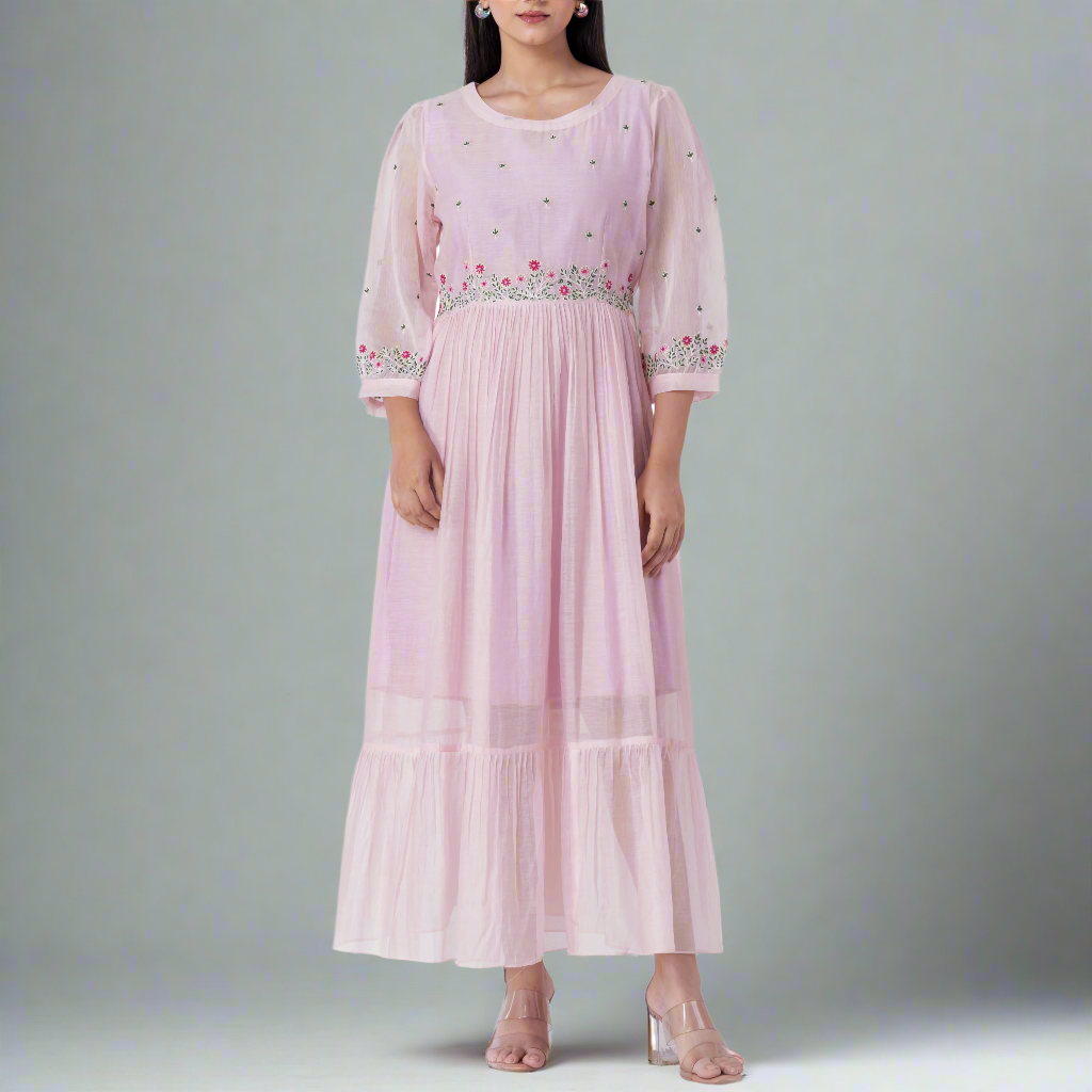 Model wearing the floral embroidered cotton silk midi dress, highlighting its fit and style.