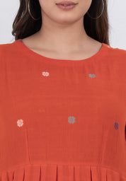 Comfortable floral embroidered handwoven cotton dress with pleated A-line style.