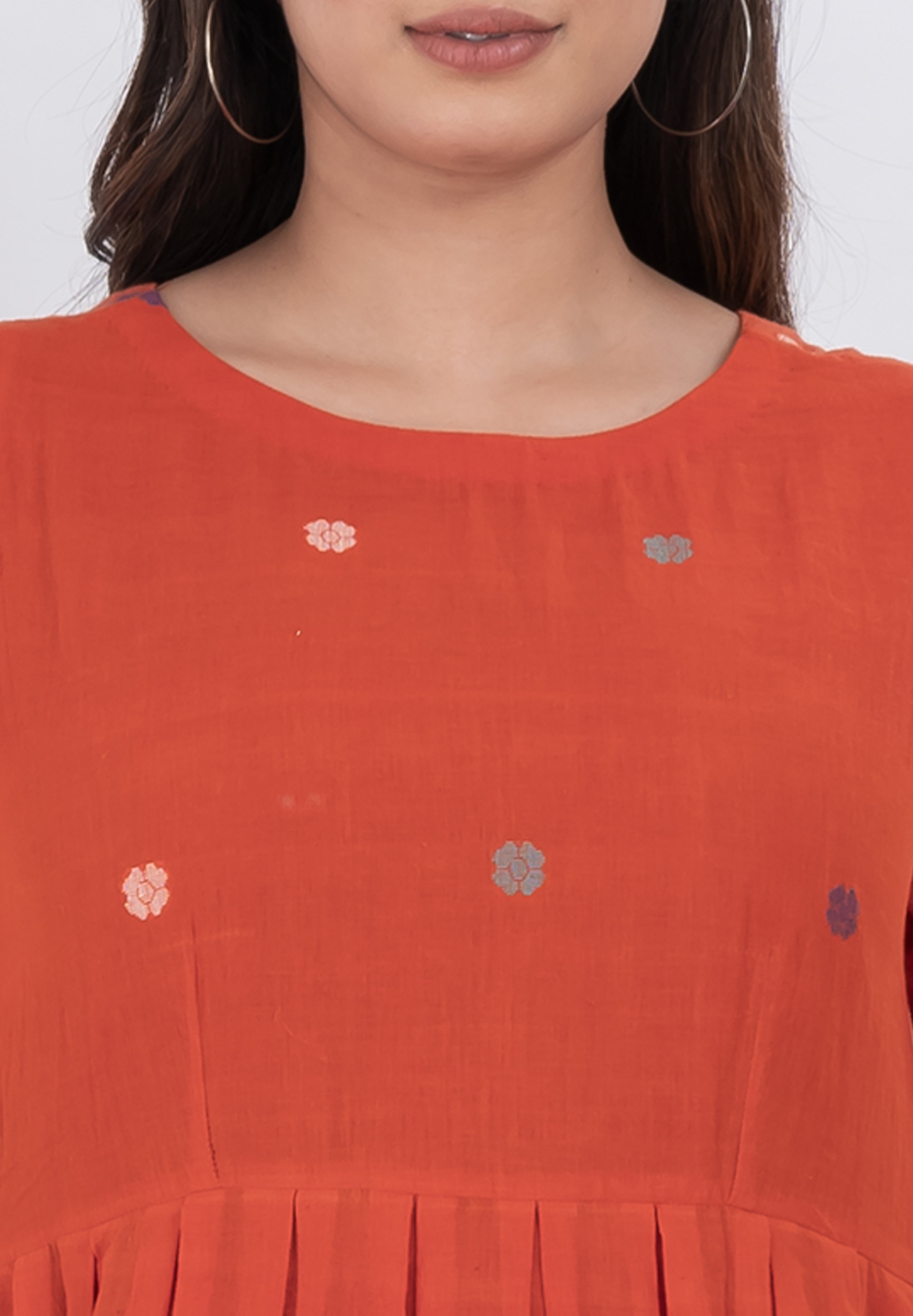 Comfortable floral embroidered handwoven cotton dress with pleated A-line style.
