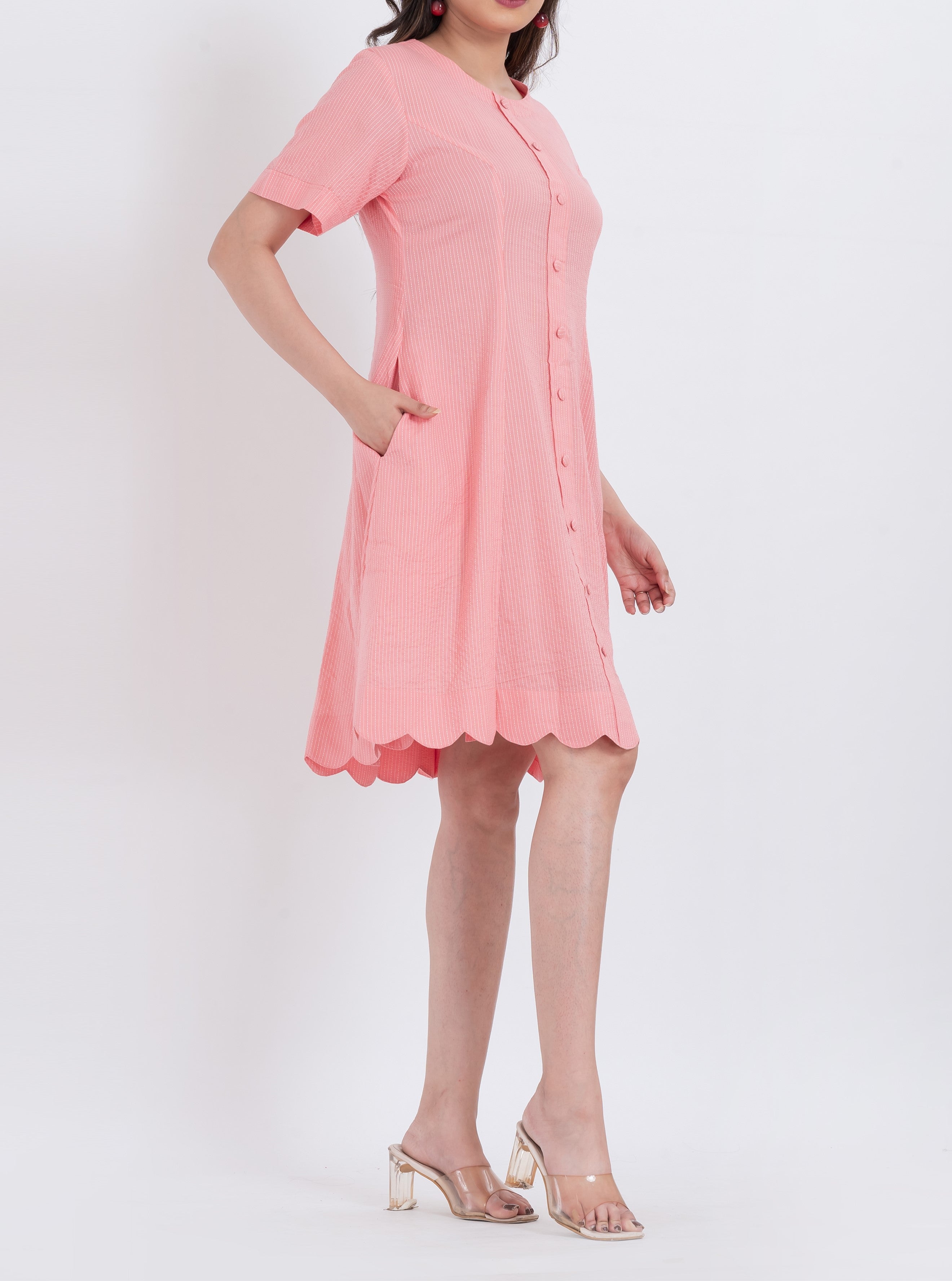 A-line cotton dress with scallop hem and button-down detailing for a flattering fit