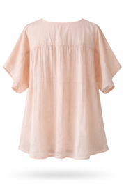 Light pink blouse on a white background