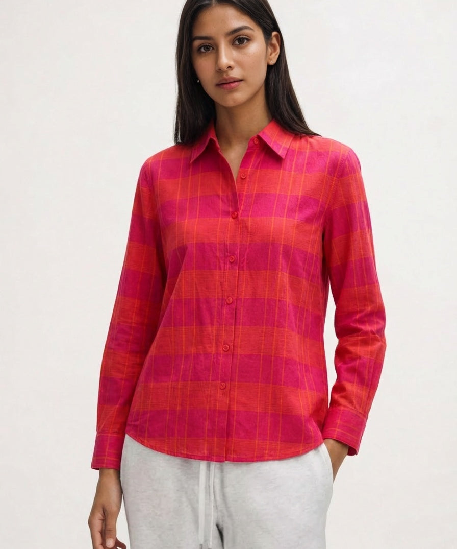 Woman wearing a red and pink plaid shirt soft fabric