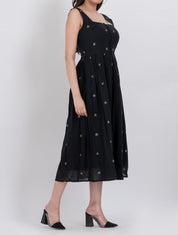 Elegant floral handwoven cotton dress with A-line silhouette and button front.