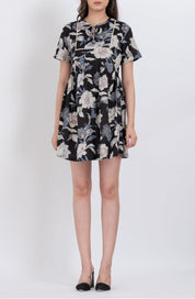 Floral tie neck babydoll dress with short sleeves and a flowy skirt