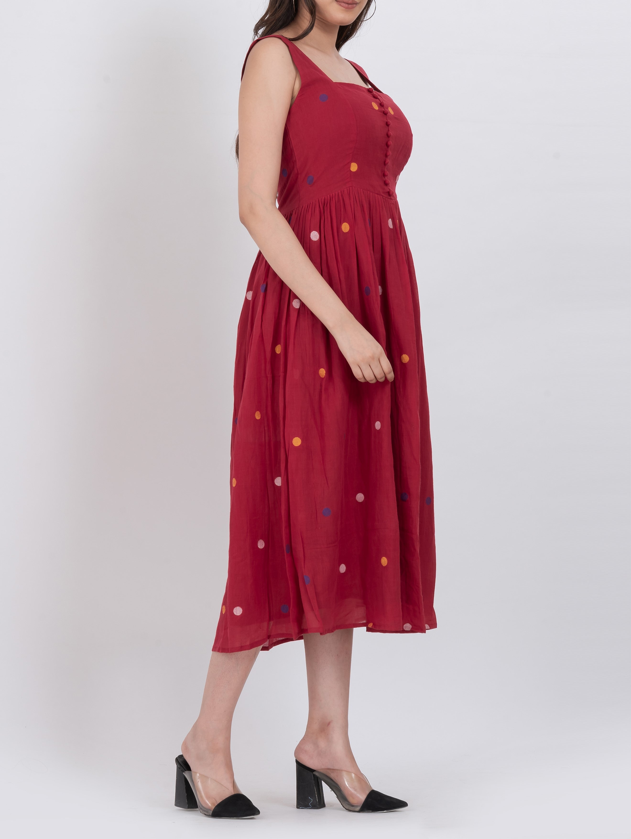  Floral polka dot handwoven cotton dress featuring button closure and A-line fit.