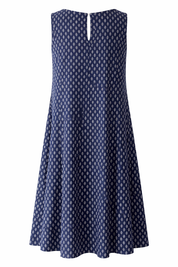 Navy blue dress with white geometric pattern on a white background