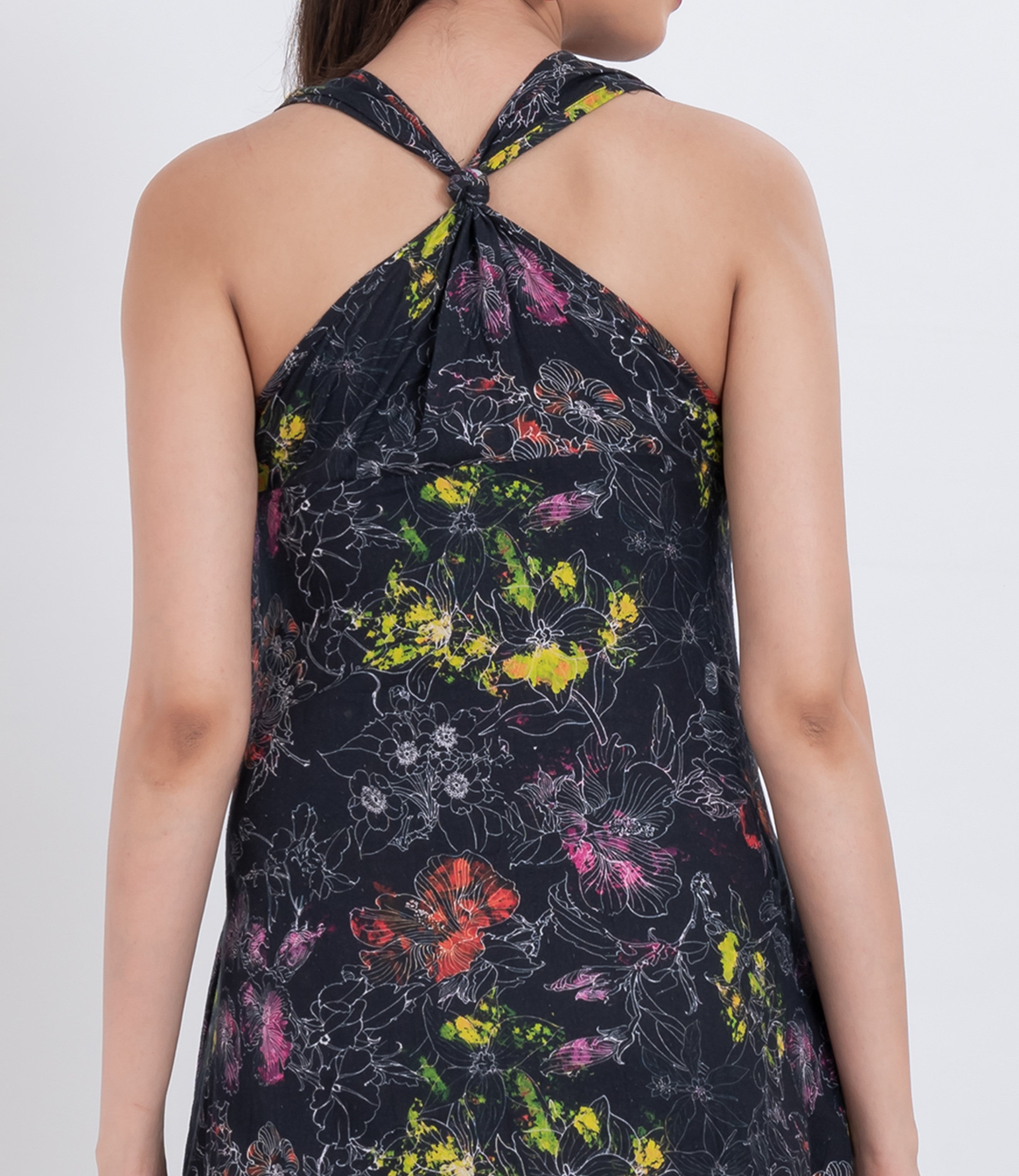 floral sleeveless a-line maxi dress made from breathable handloom cotton with artistic botanical print for summer wear.