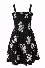 Printed smocked summer dress in geometric and floral styles
