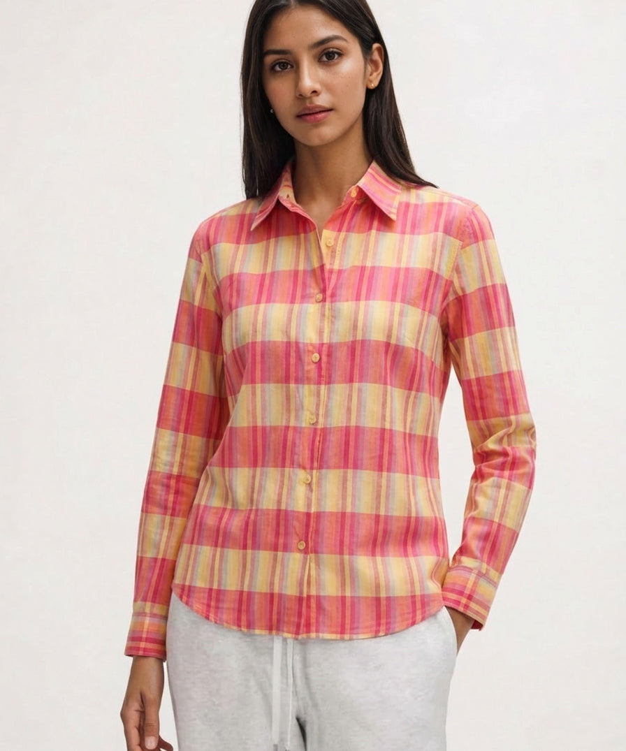 Woman wearing a pink and yellow plaid shirt women wear good looking