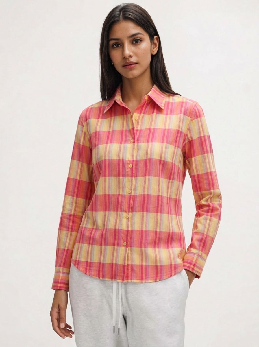 Woman wearing a pink and yellow plaid shirt women wear good looking