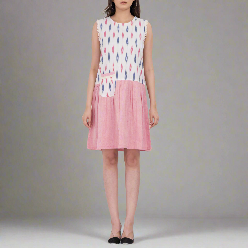 Ikat print sleeveless dress with pleated skirt and front pocket for added style