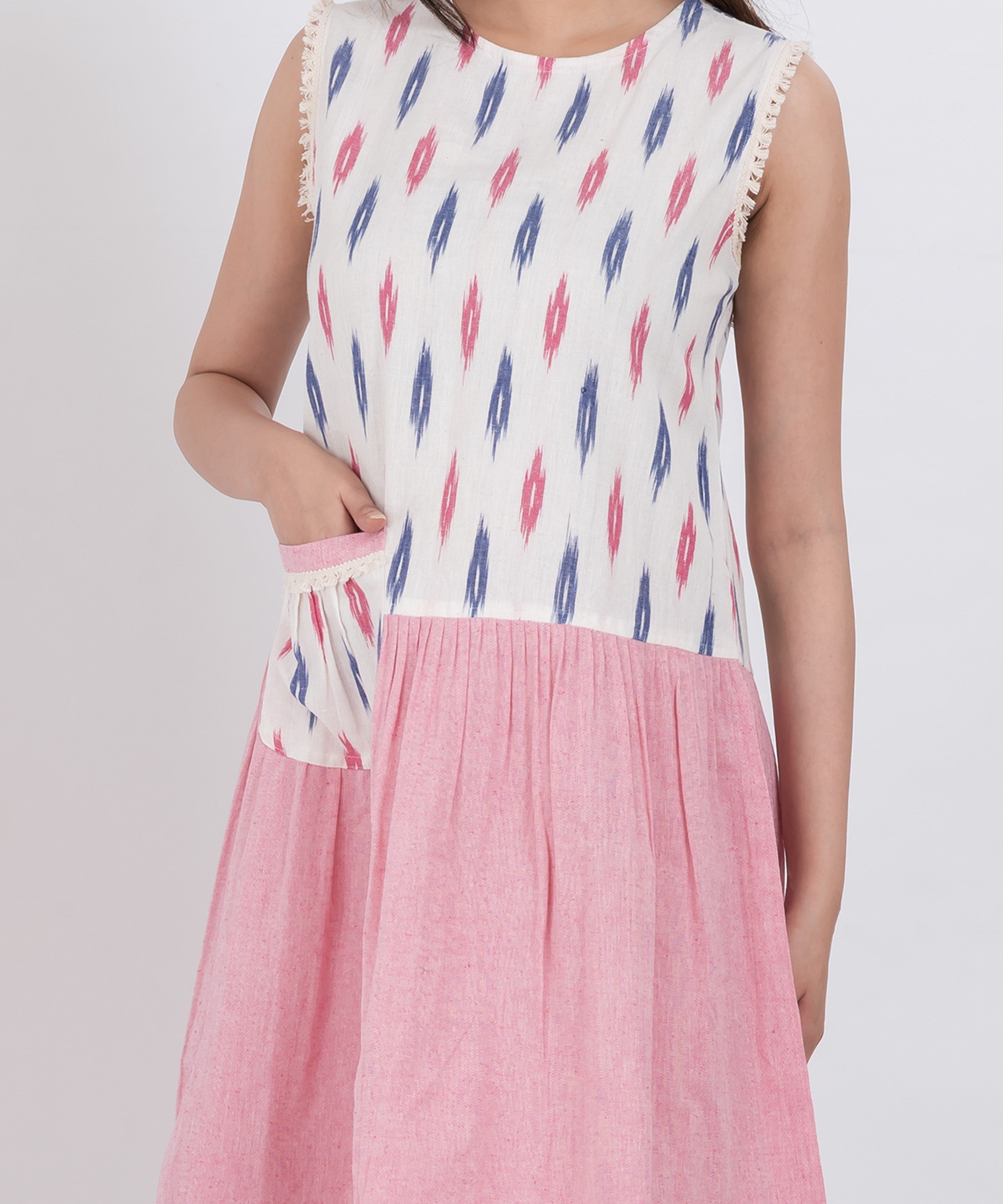 Pink pleated skirt dress with ikat print top and functional front pocket
