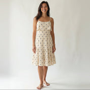 Off-white cotton midi dress with navy leaf print