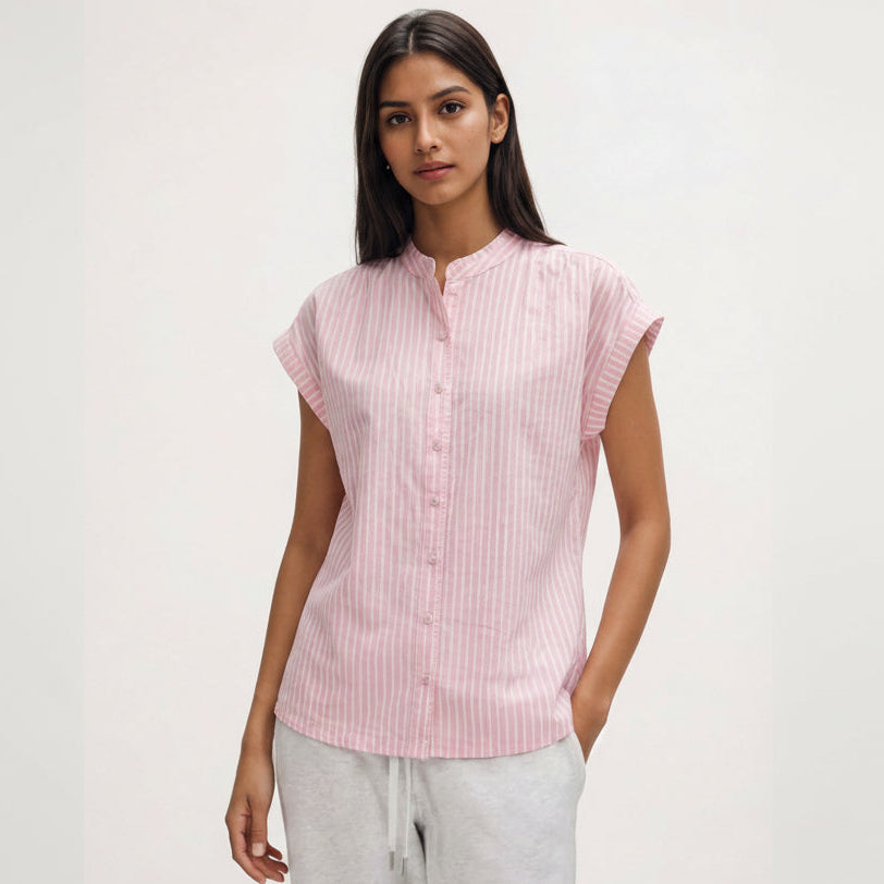 Woman wearing a pink striped shirt on a white background