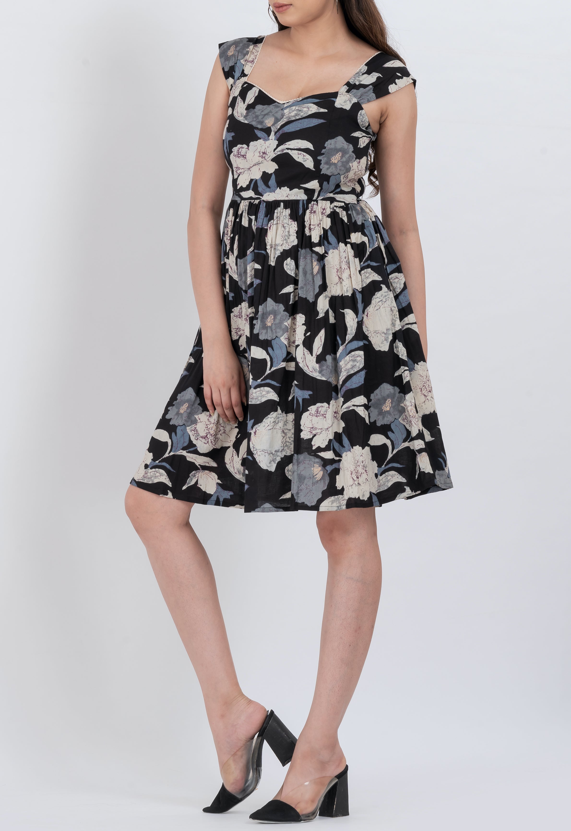 Chic floral puff sleeve dress with square neck, perfect for any occasion