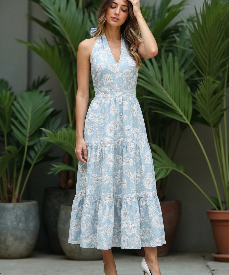 Woman wearing a light blue floral dress faire.com, alibaba.com, bestootd.com