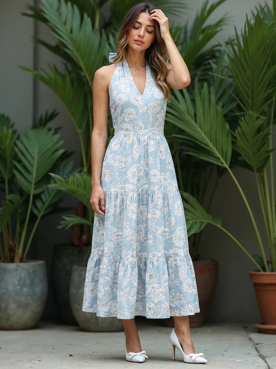 Woman wearing a light blue floral dress faire.com, alibaba.com, bestootd.com