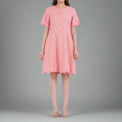 Short sleeve cotton dress with a button-up front and scalloped hemline for added charm