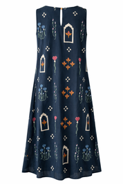 Navy blue dress with colorful floral and geometric patterns on a white background