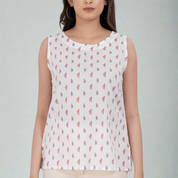 Sleeveless floral print blouse with delicate block patterns.