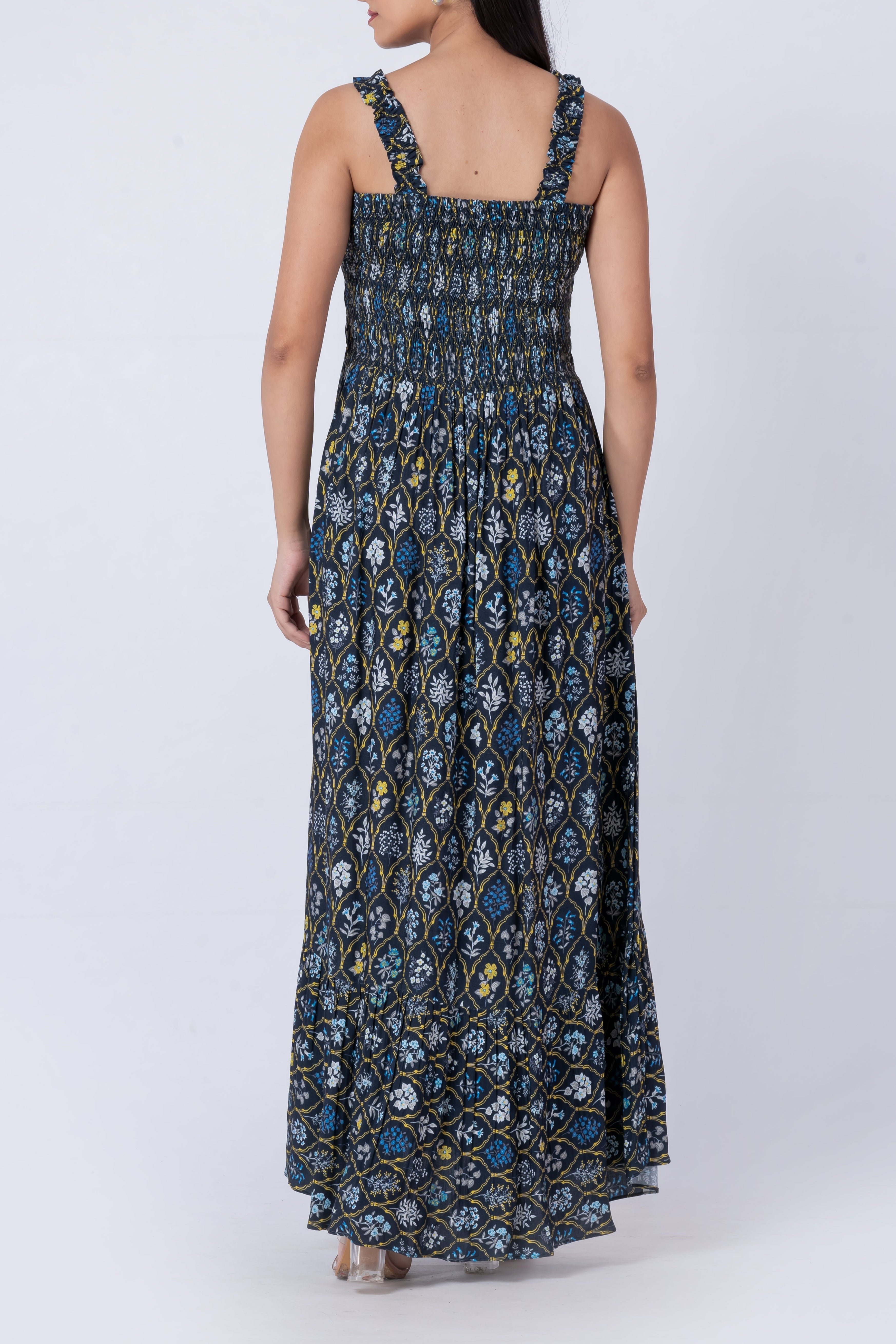 Floral print maxi dress with thin straps and smocked detailing.
