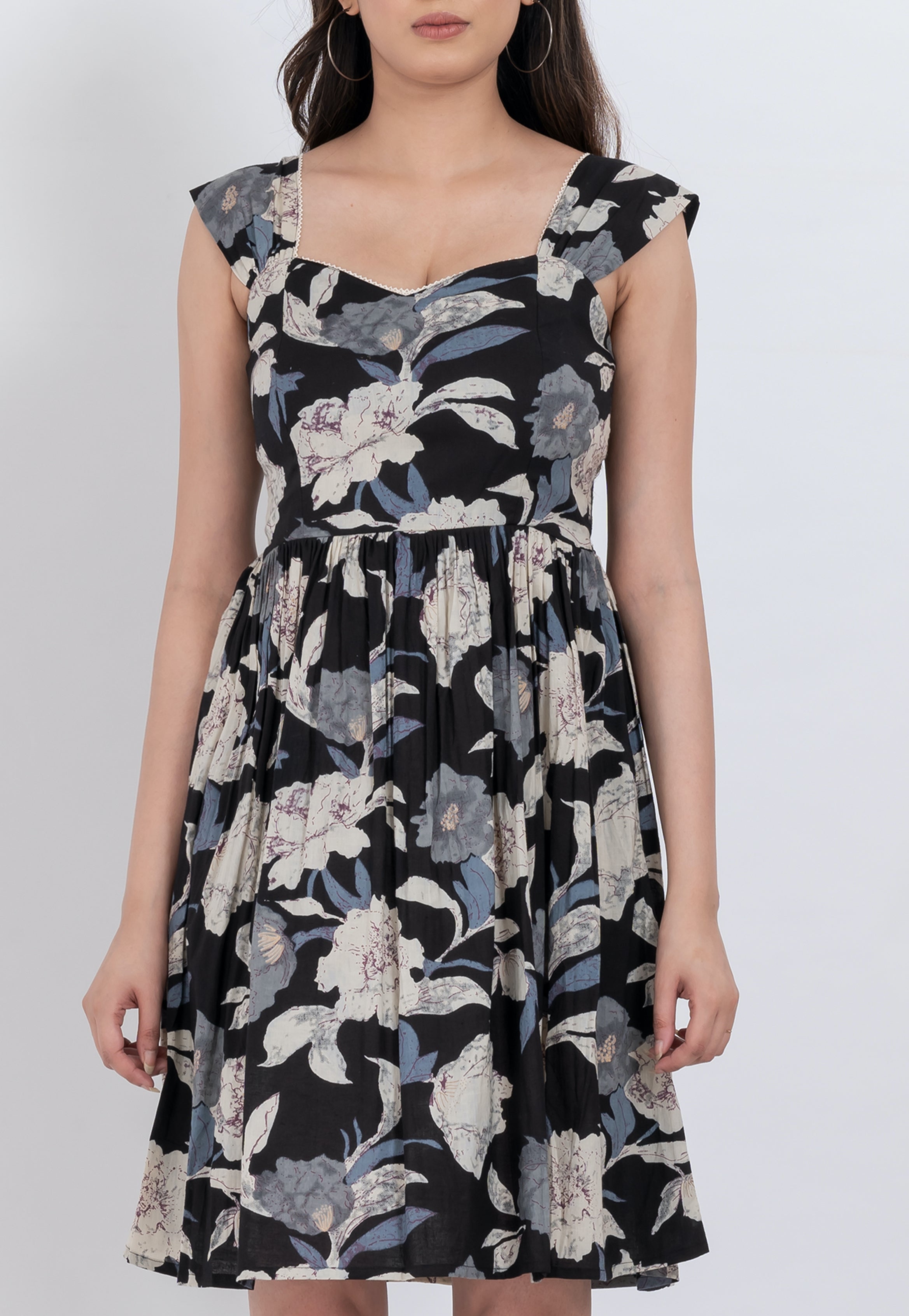 Stylish square neck floral dress with puff sleeves and relaxed A-line fit