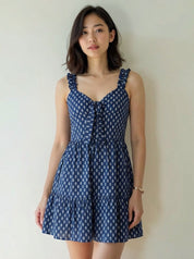 Woman wearing a blue patterned dress bestootd.com wholesale OEM, ODM, LOW MOQ women's dress