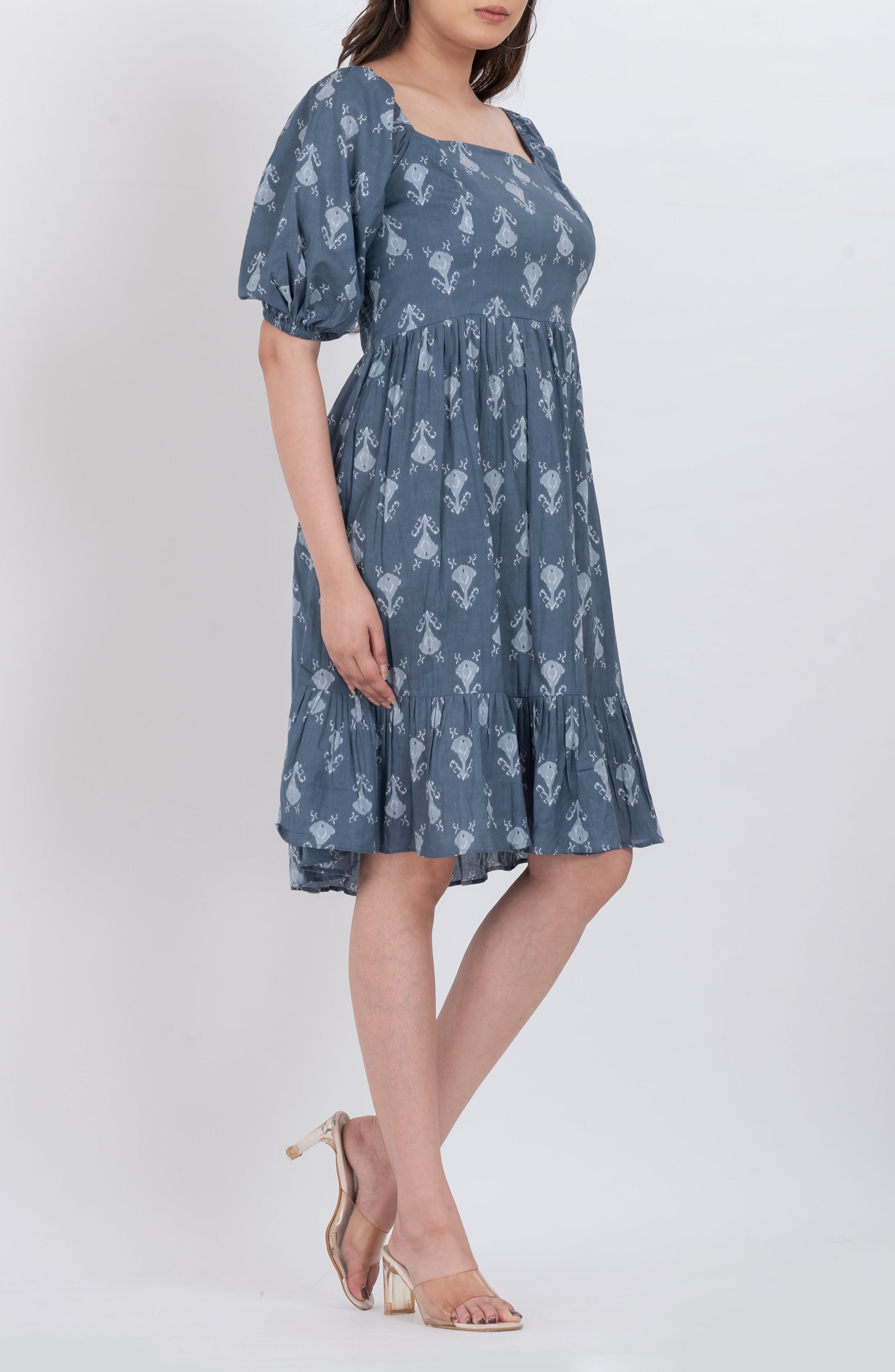 Boho-inspired floral square neck puff sleeve dress with ruffled hem