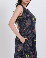 tropical floral print a-line maxi dress for women crafted from airy handloom cotton with sleeveless design for warm weather.