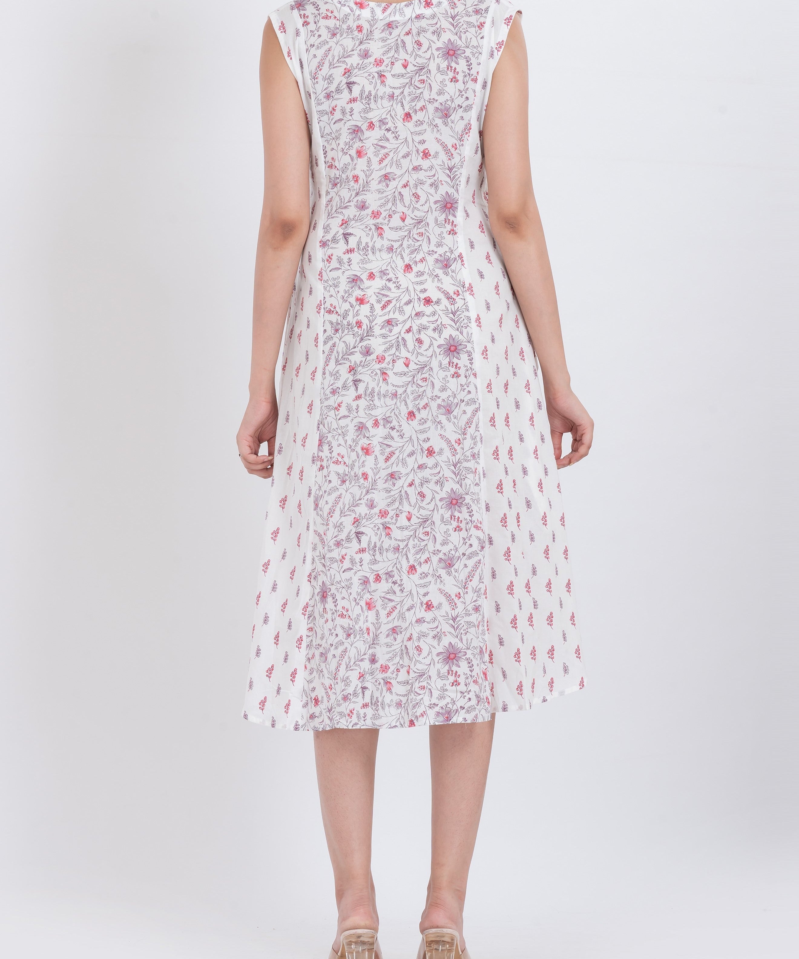 Floral printed cotton midi dress with V-neck and pleated detail for added movement
